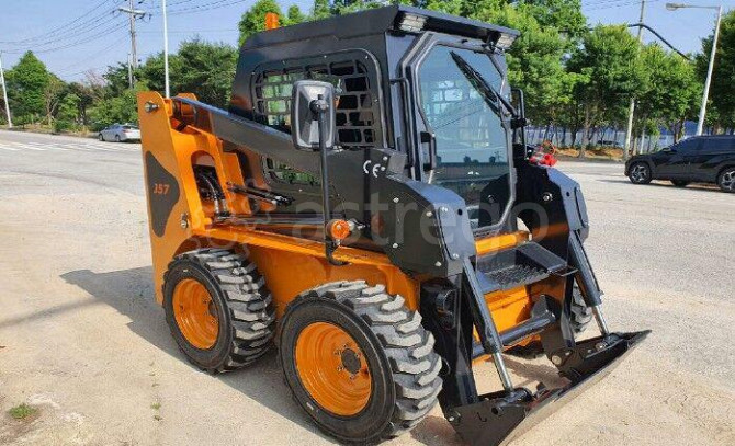 Мини-погрузчик с бортовым поворотом Bawoo J57 двигатель Kubota V2403 Новосибирск - изображение 1